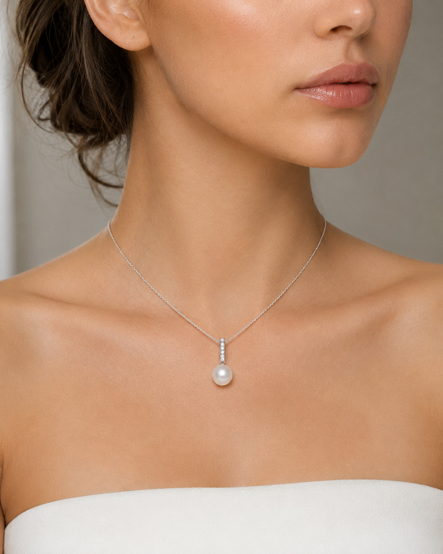Anhänger mit Südseeperle & schwingendem Diamanten