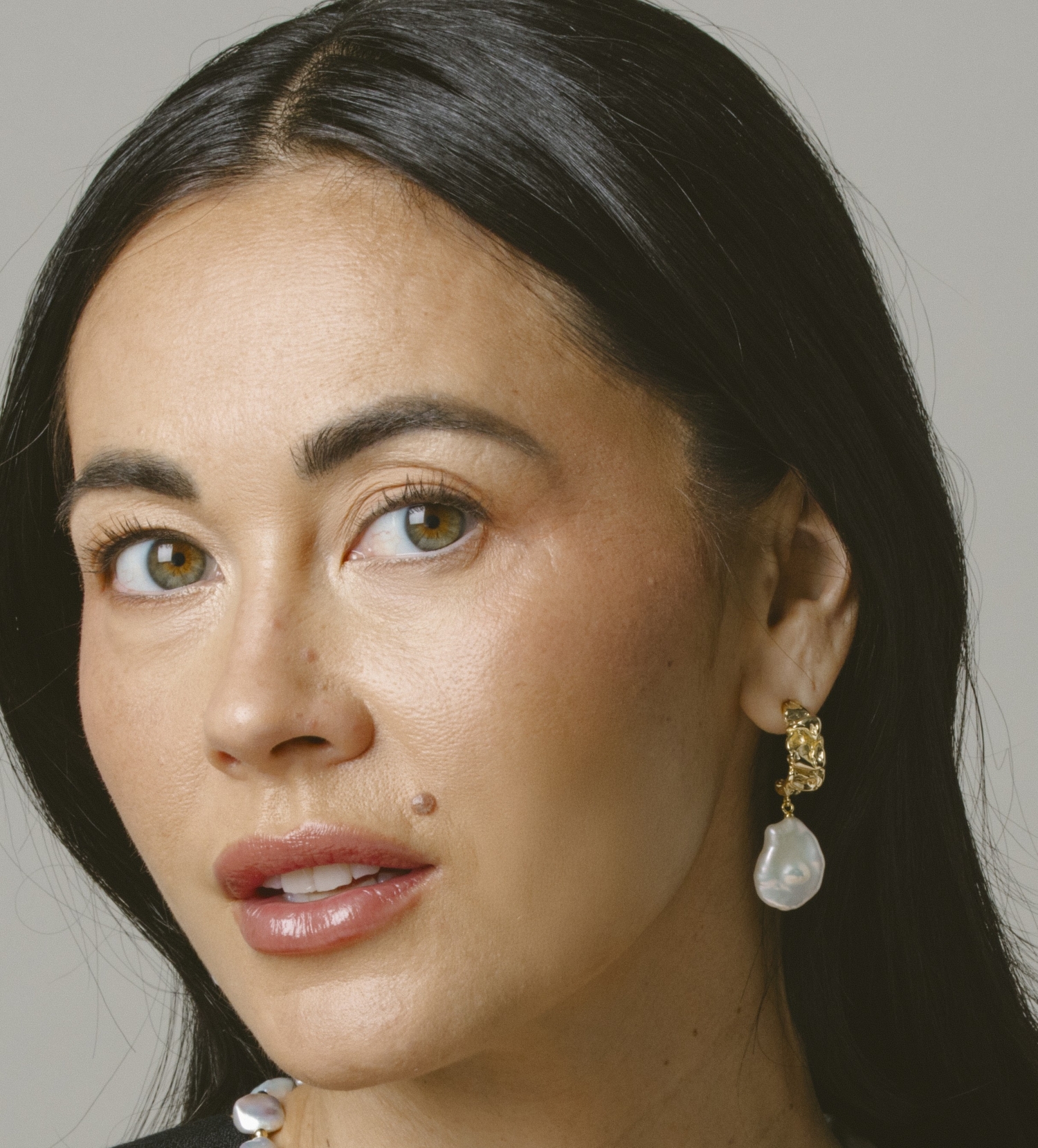 White Freshwater Baroque Hoop Pearl Goldie Earrings - Model Image